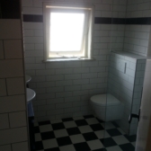 Badkamer II - Het toilet.